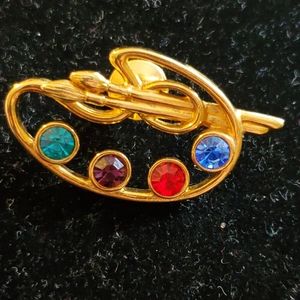 Avon goldtone artist's palette brooch colored rhinestones 1 3/4 inches wide